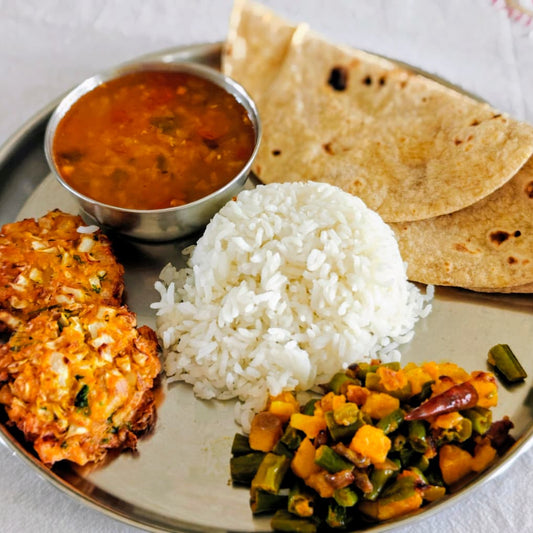 Masoor Dal , Pakodi , Vegetable Roti Rice Thali