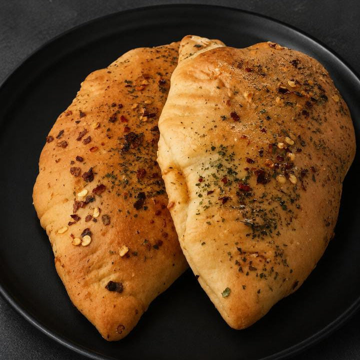 Chicken & Paneer Calzones.